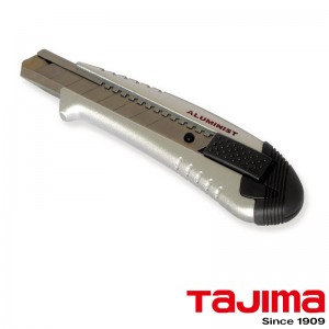 Tajima Cutter 25 mm bi-matière (blocage auto. par bouton)